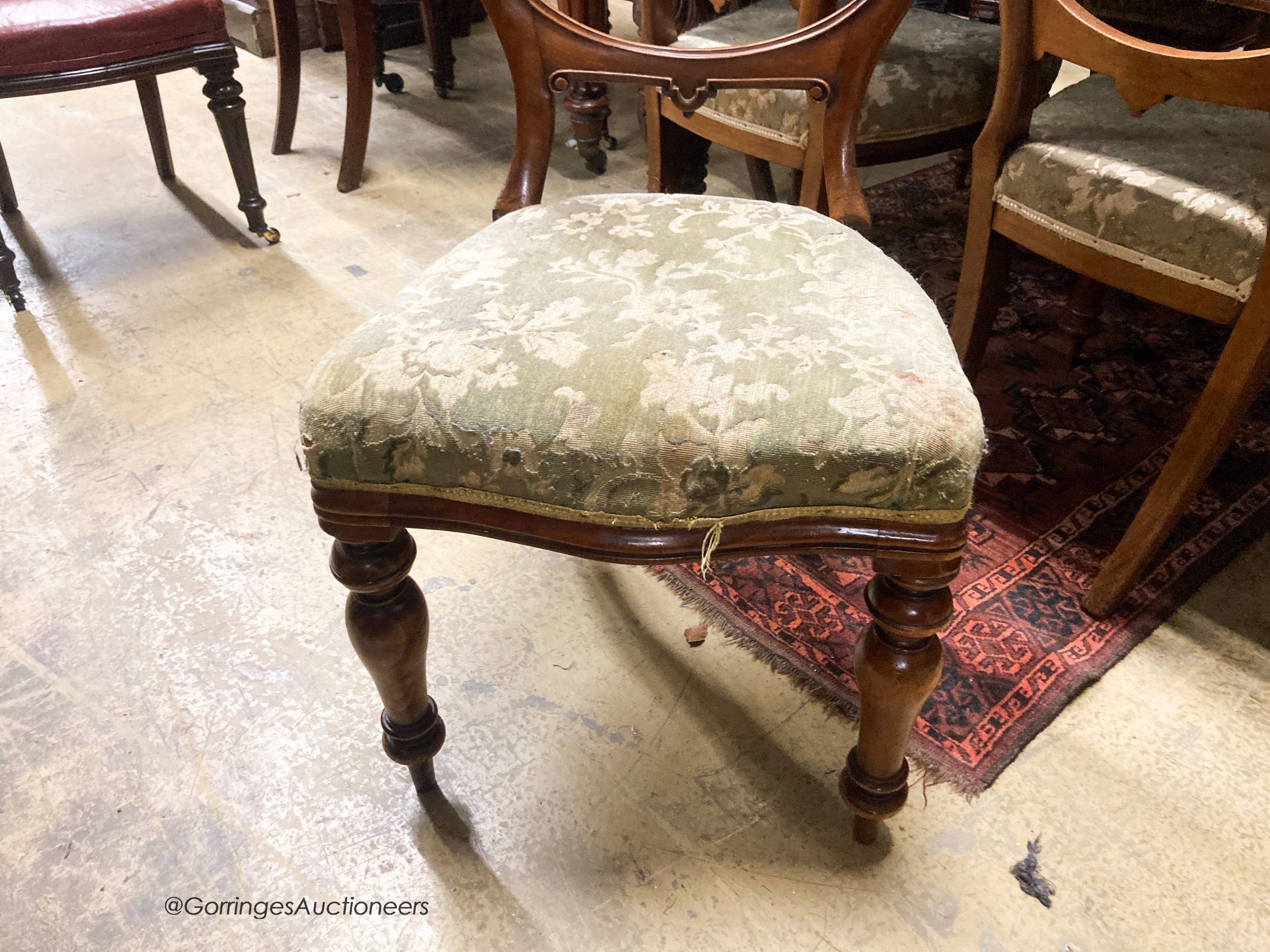 A late Victorian mahogany extending dining table, 238cm extended, two spare leaves, depth 118cm, height 72cm together with a set of eight Victorian mahogany balloon back dining chairs